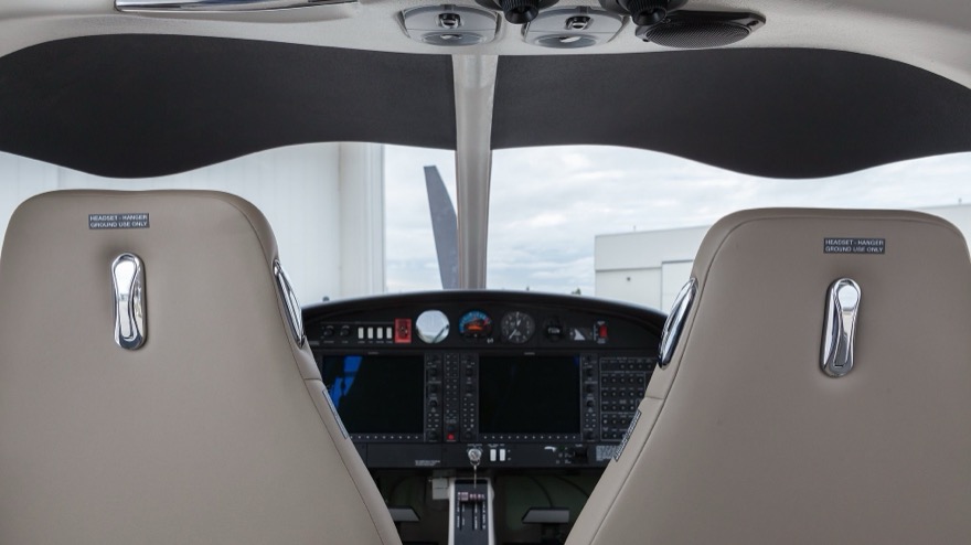 Bubble canopy and cockpit from behind